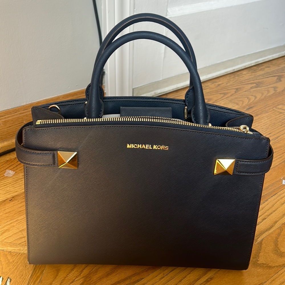 Dark blue crossbody/satchel. Gold trim.